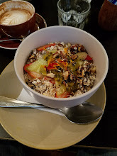 Bircher muesli bowl with fruit beside a coffee at Marlowe's Way