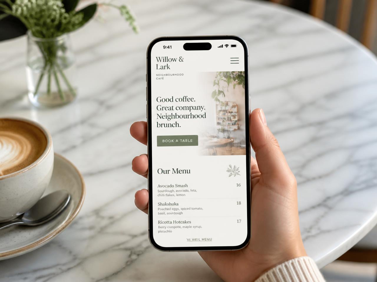 Mobile website design for a café shown on a smartphone